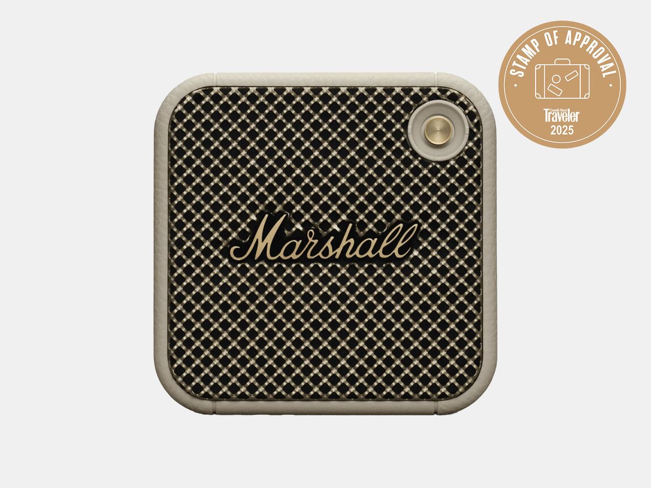 cream and black portable speaker