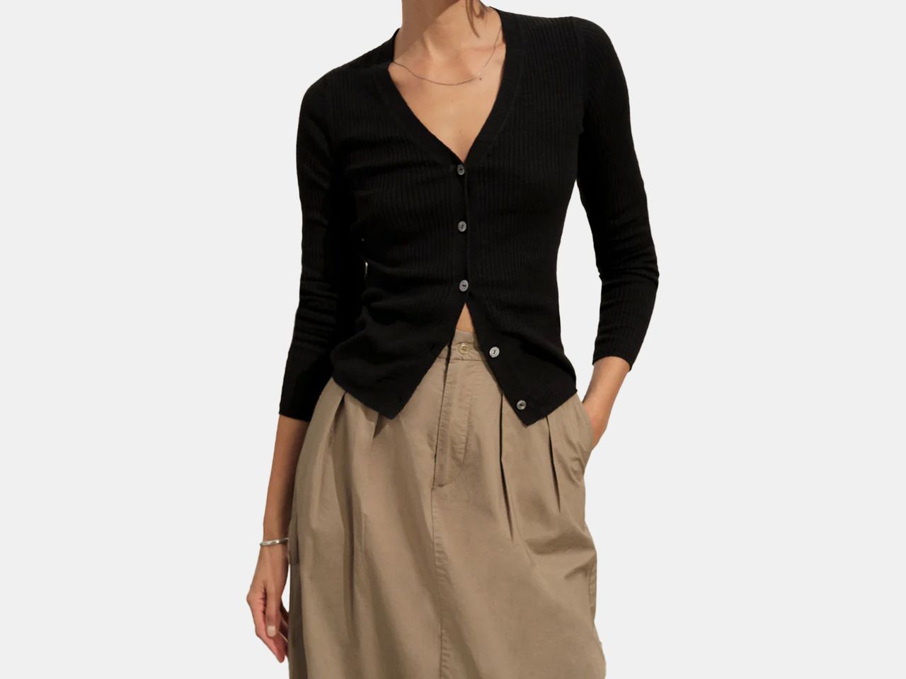 model in black button down sweater