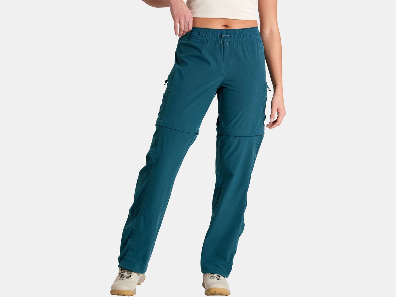 model in teal pants