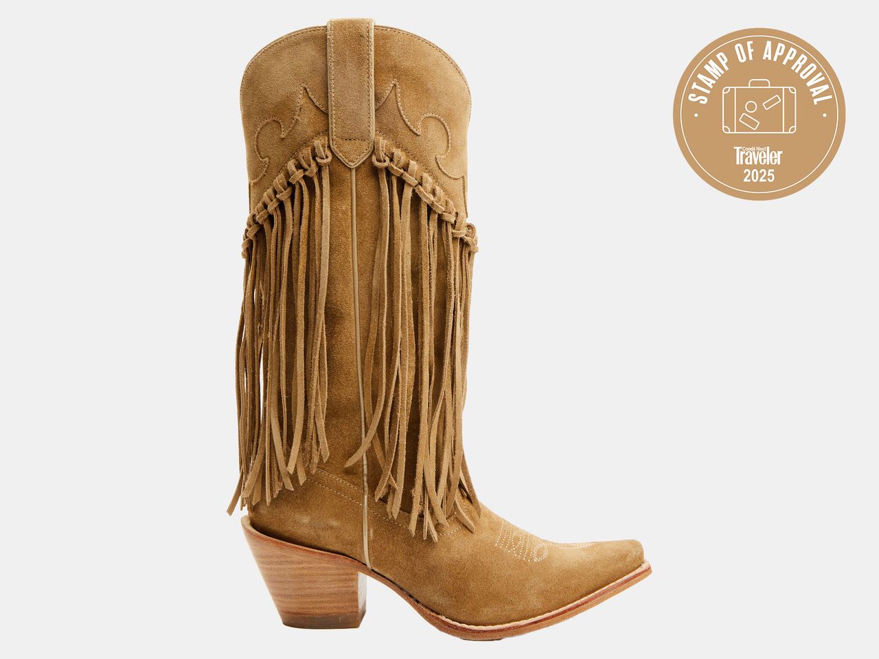 khaki colored boots with strings going down
