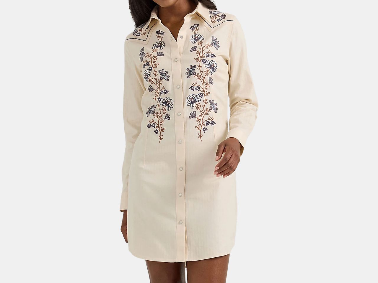 model wearing white shirt dress with colored florals