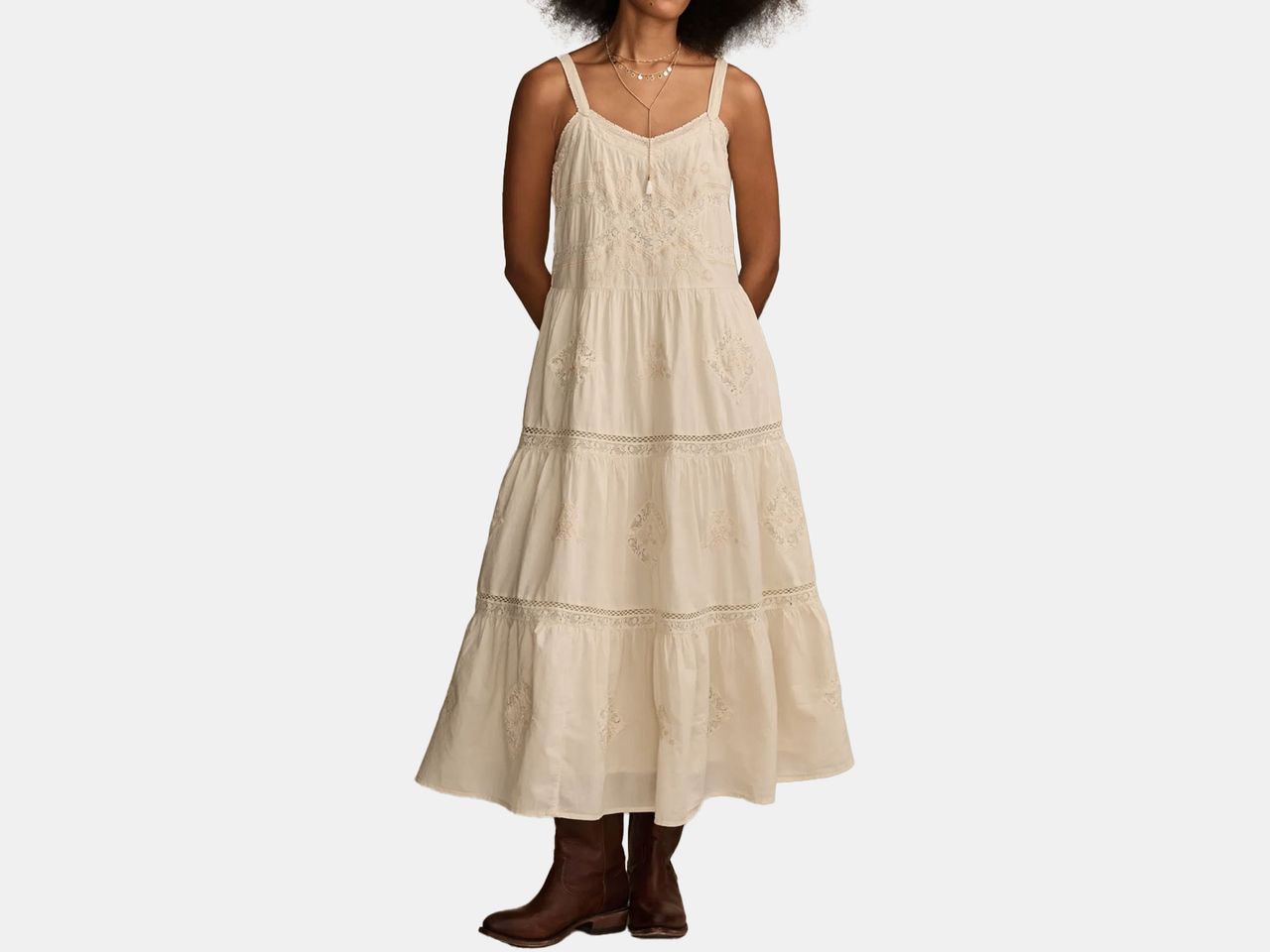 model wearing cream maxi dress