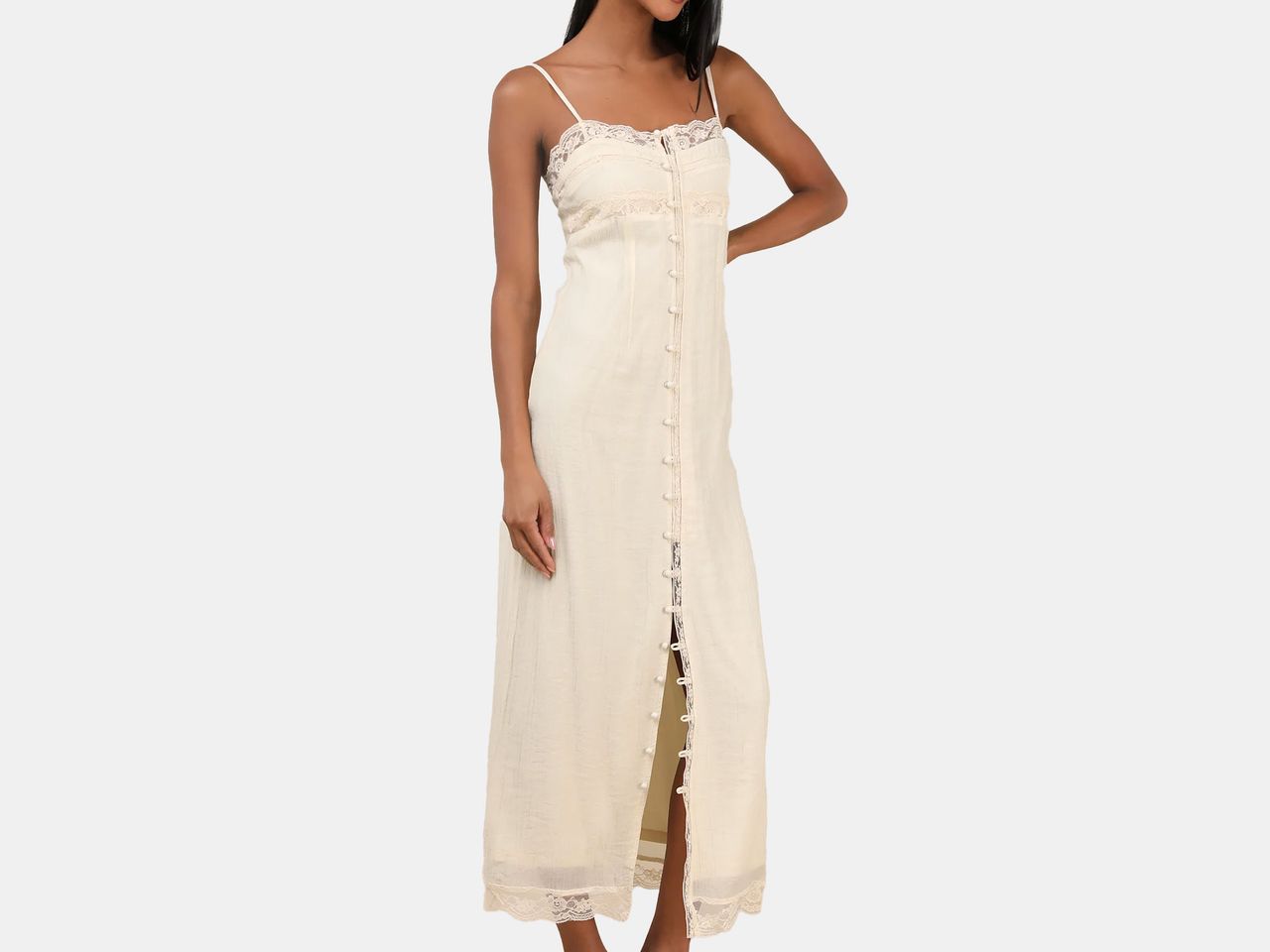 model wearing long cream dress