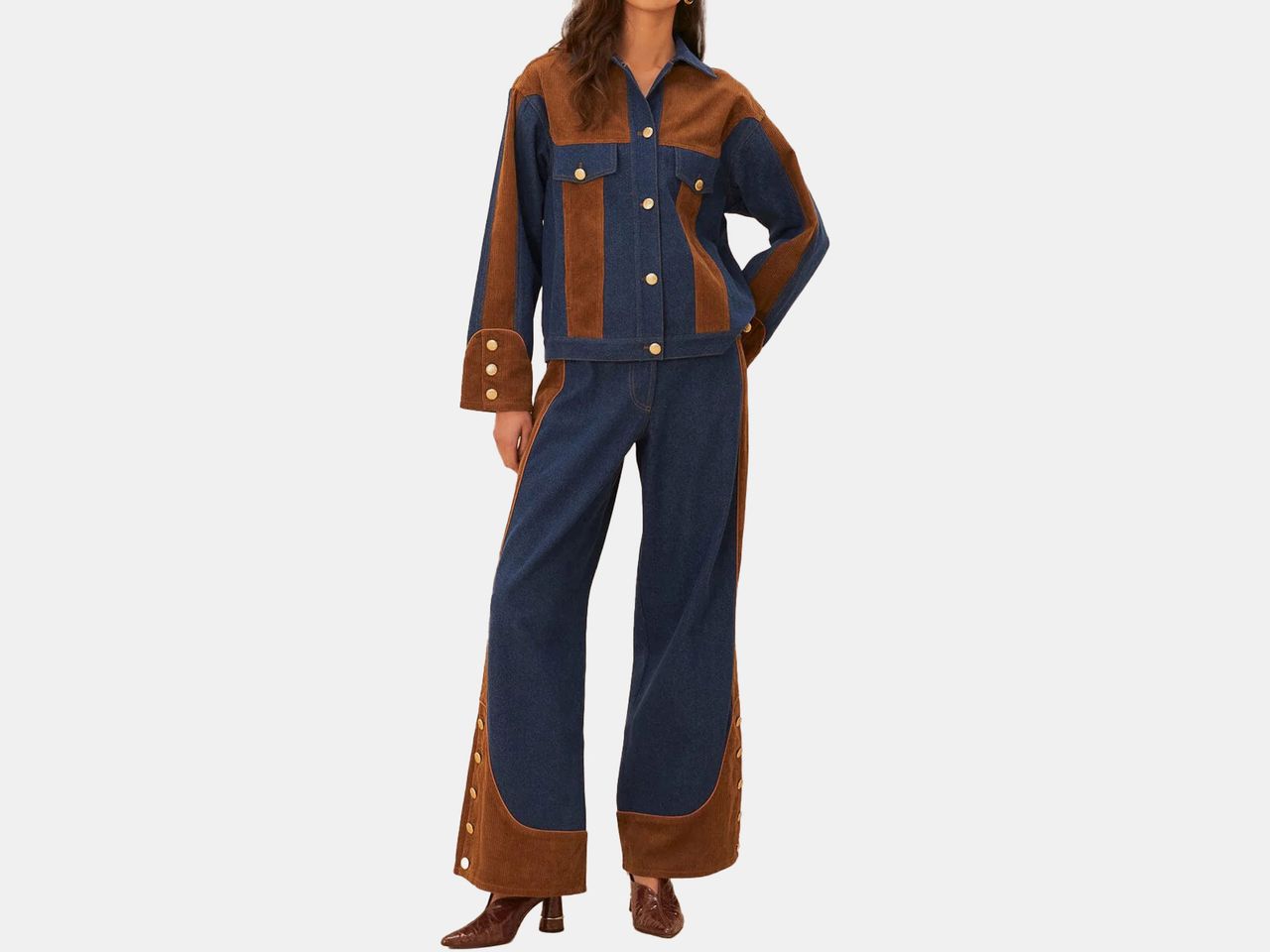 model wearing white blue and brown jean pants and matching shirt