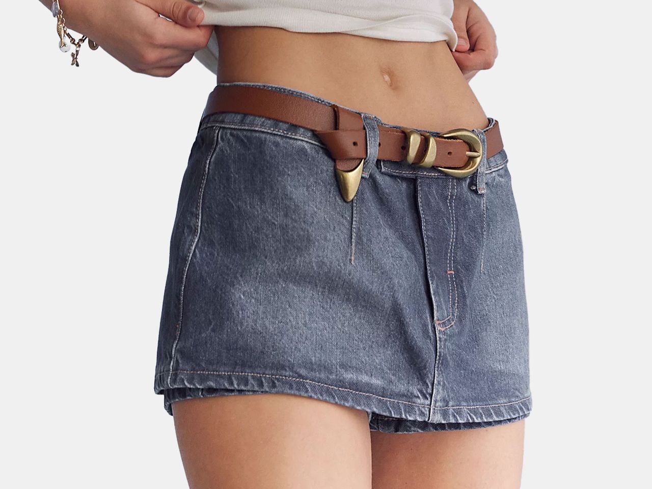 model wearing mini jean skirt