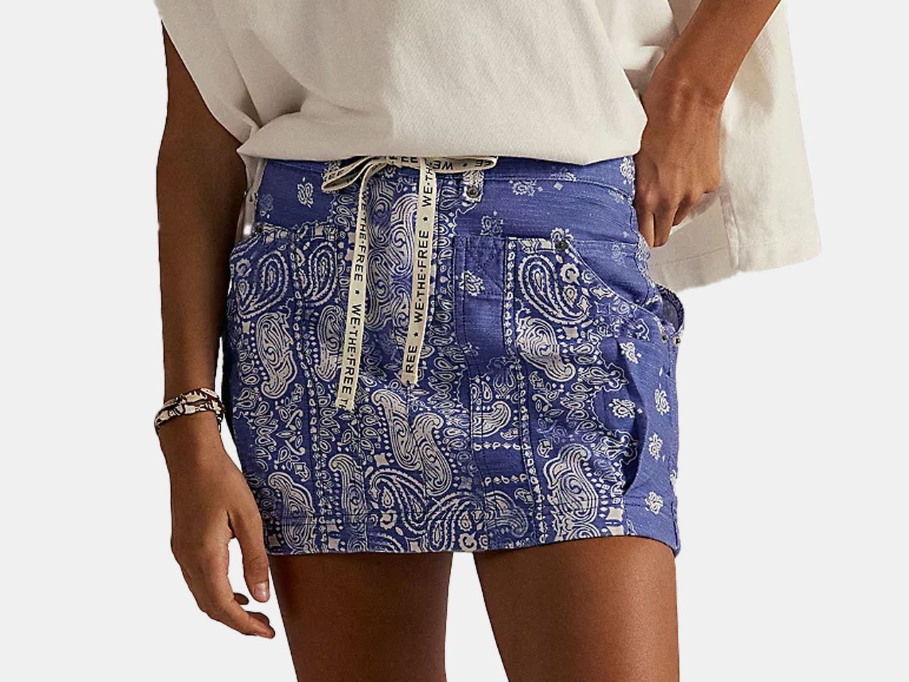 model wearing blue printed mini skirt