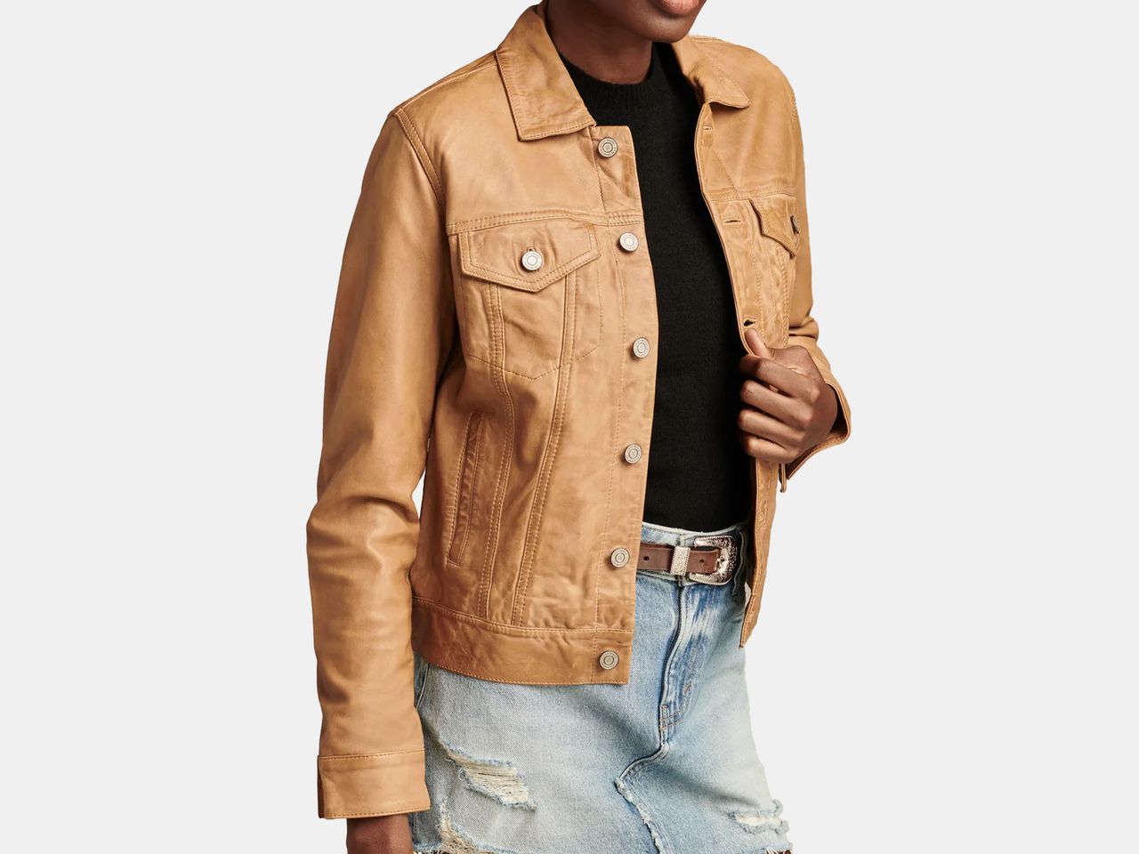 model wearing khaki colored leather jacket