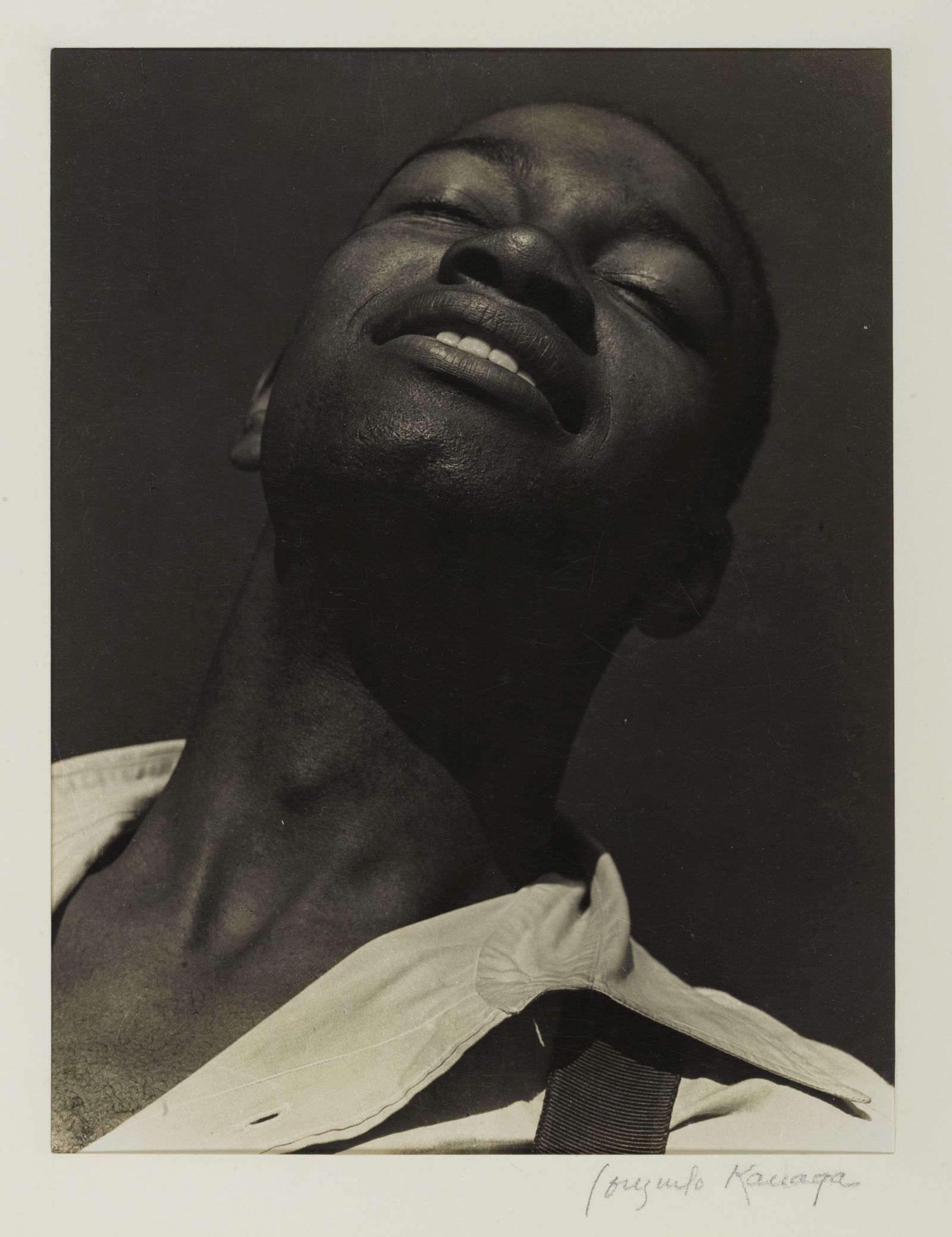 Image may contain Kenneth Lee Spencer Body Part Face Head Neck Person Photography Portrait Adult and Happy