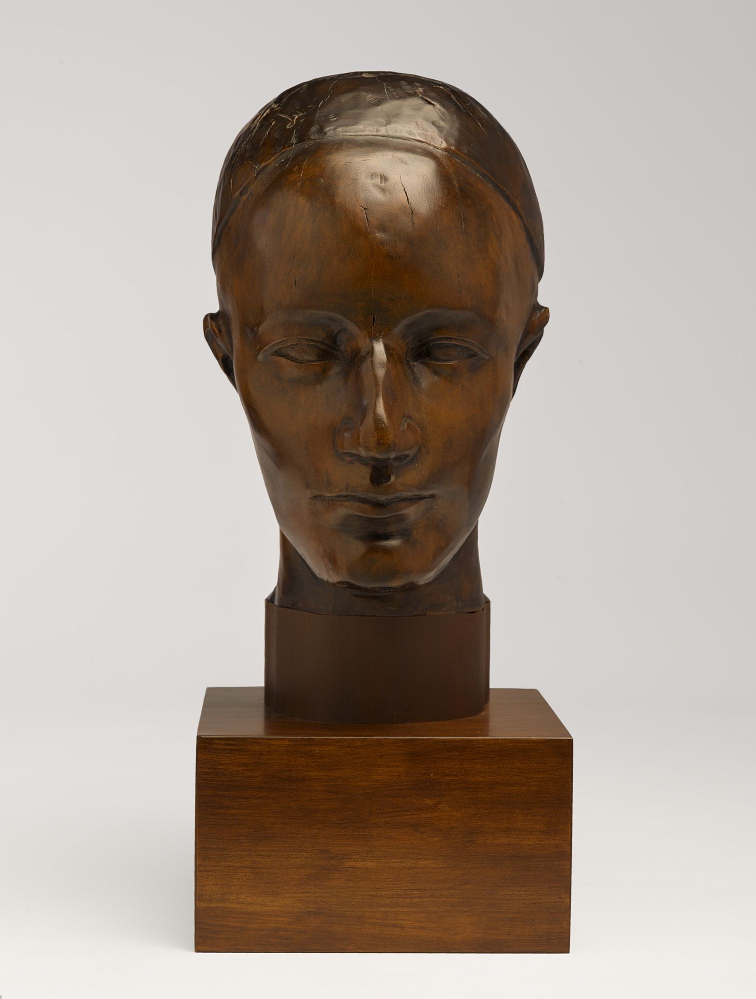 Image may contain Bronze Art Adult Person Face and Head
