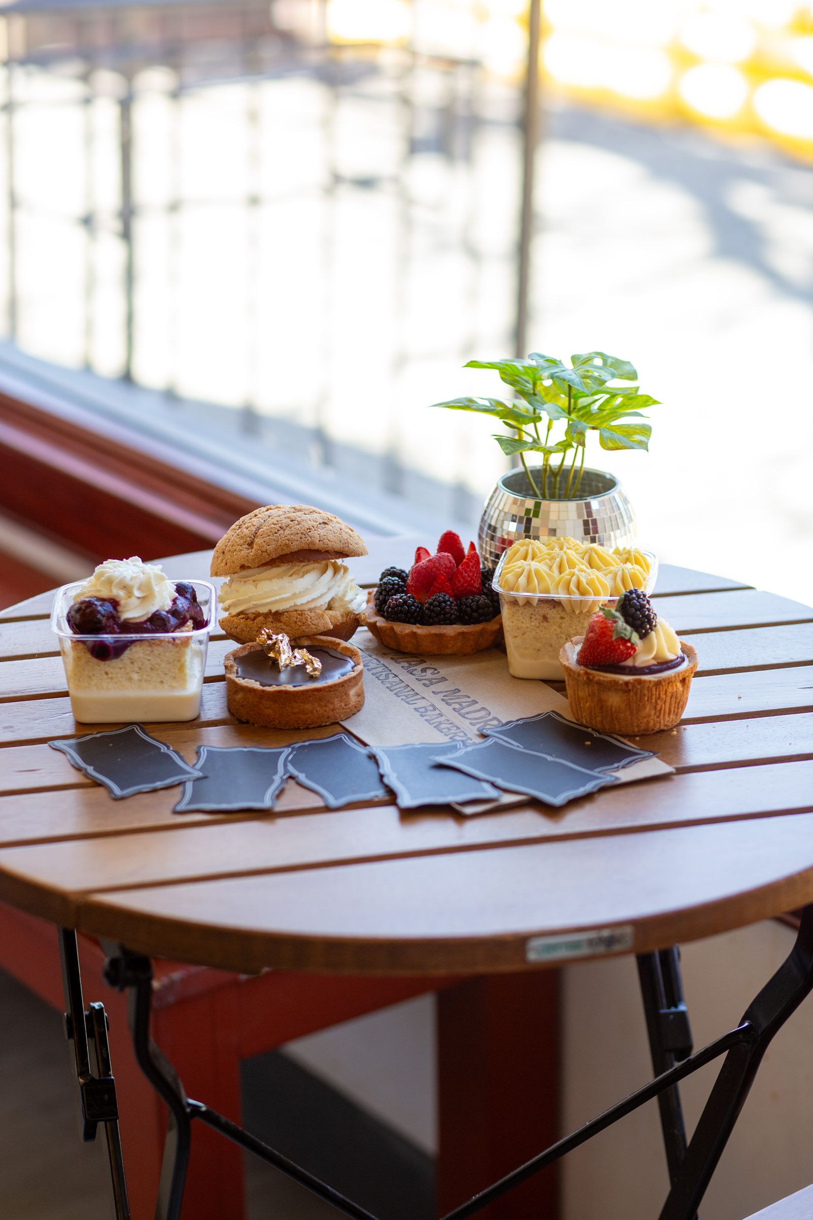 Image may contain Brunch Food Plant Furniture Table Desk Tabletop Bread and Cup