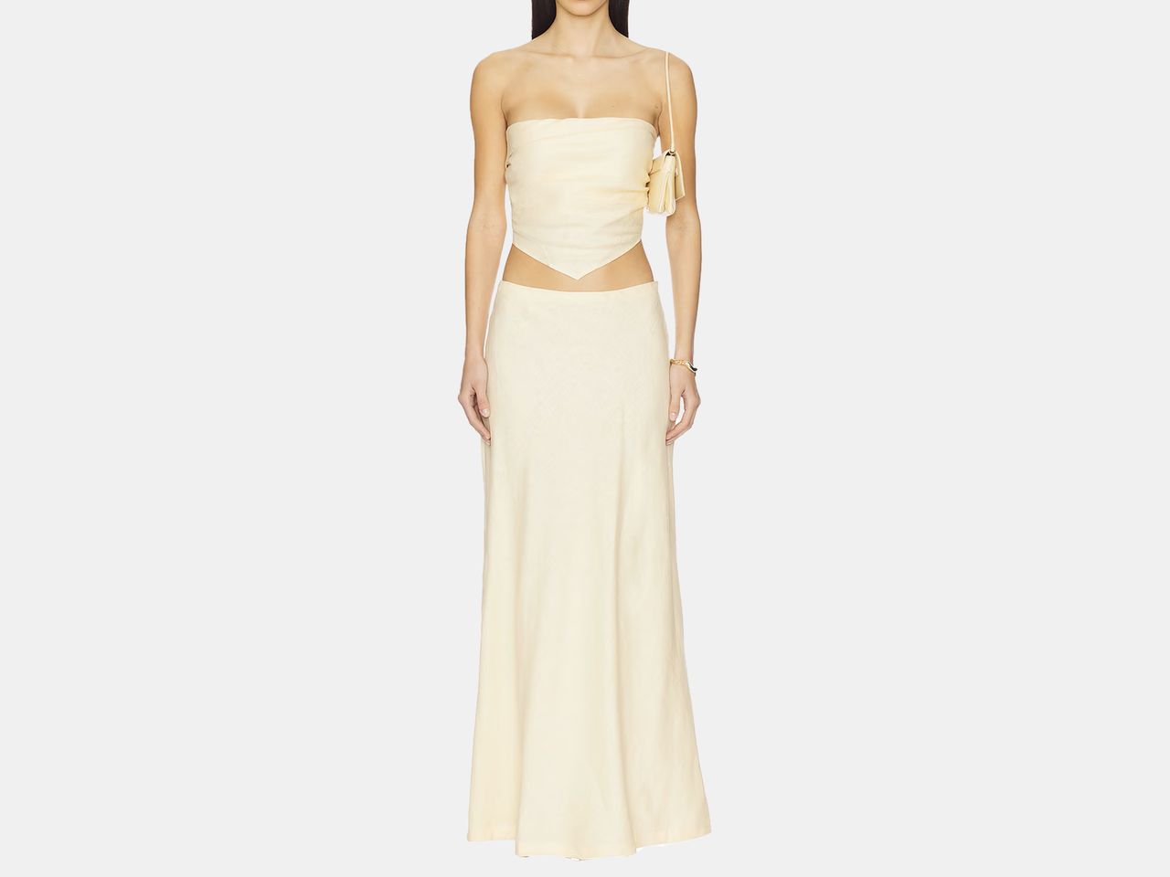 model in cream skirt and tube top