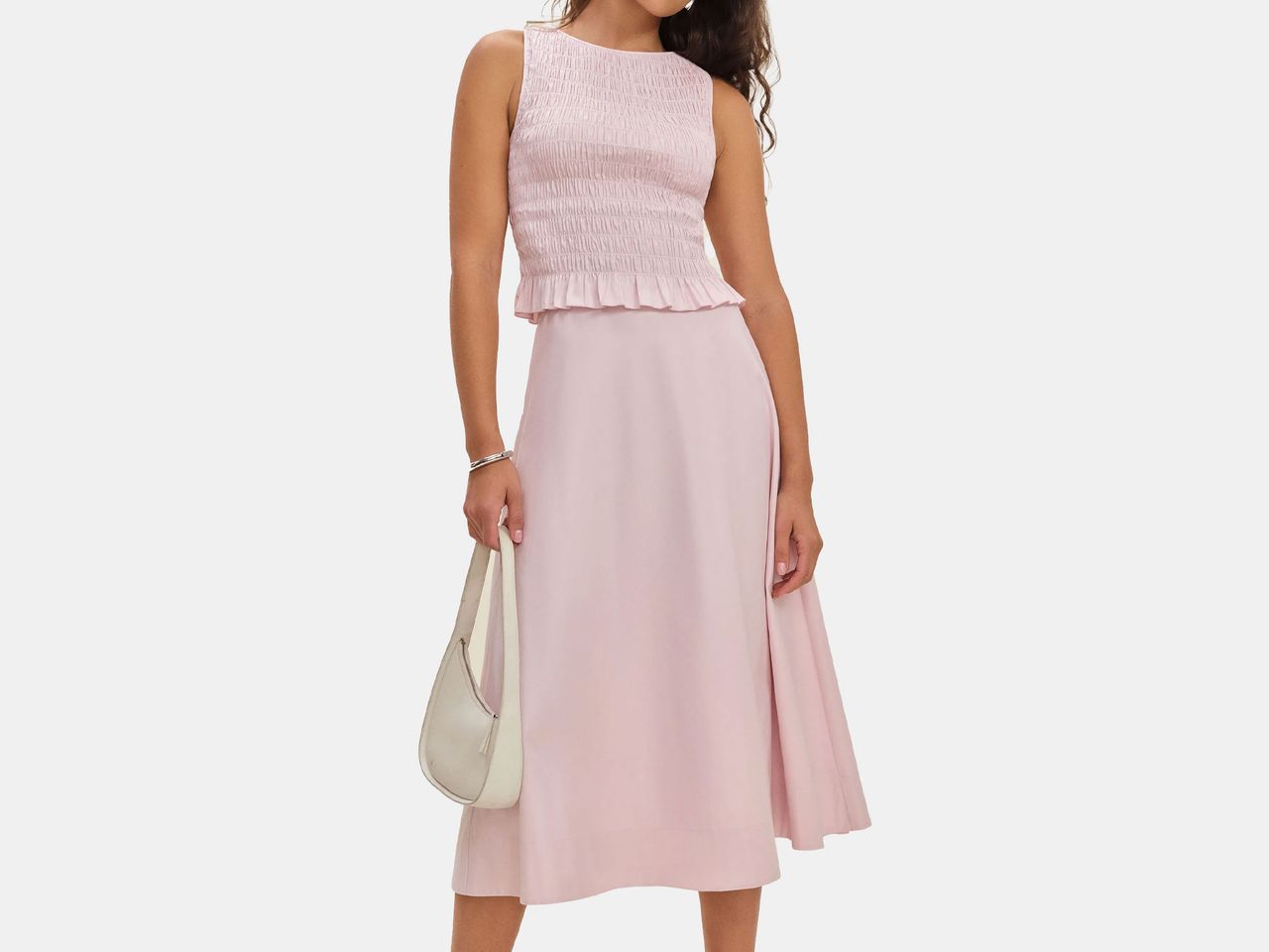 model in light purple tank top and skirt