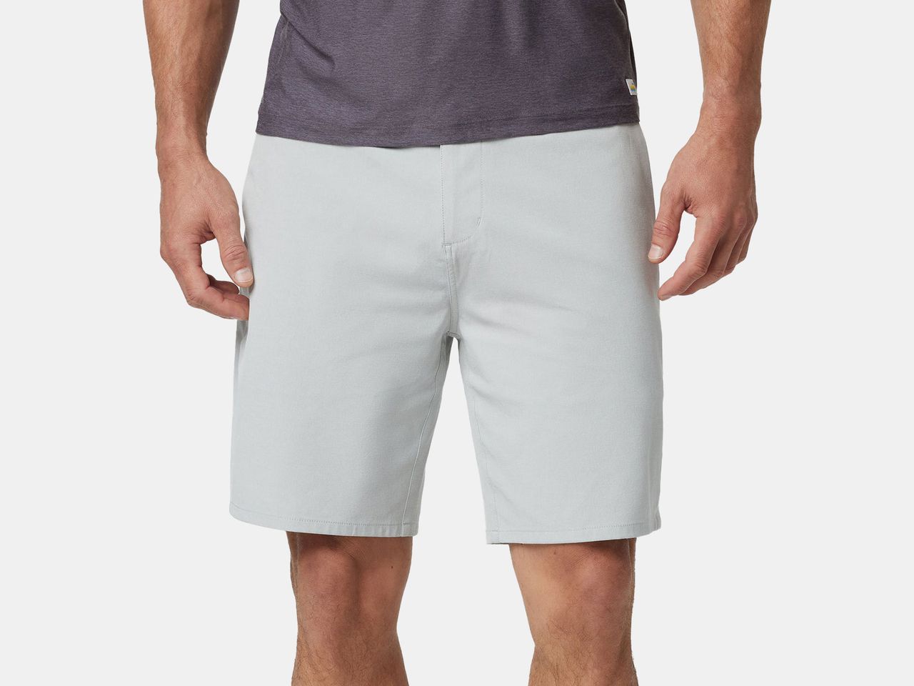 model in grey shorts