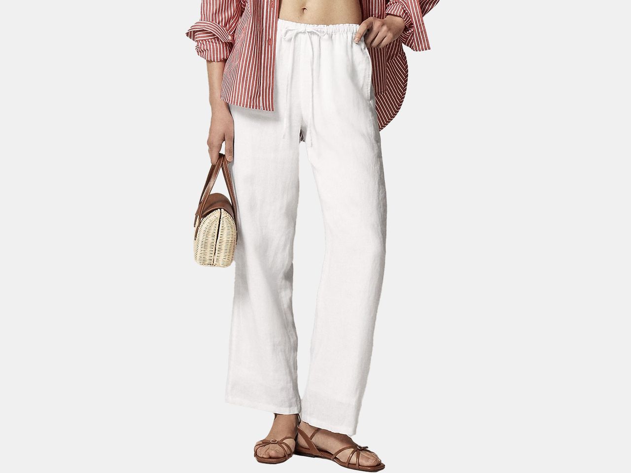 model in white linen pants