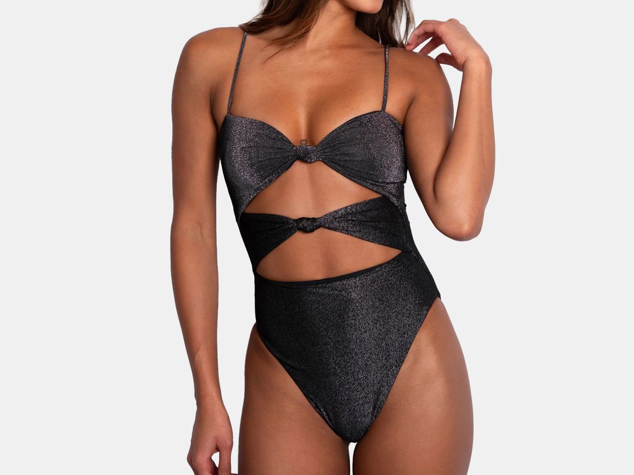 model wearing black shimmery bathing suit