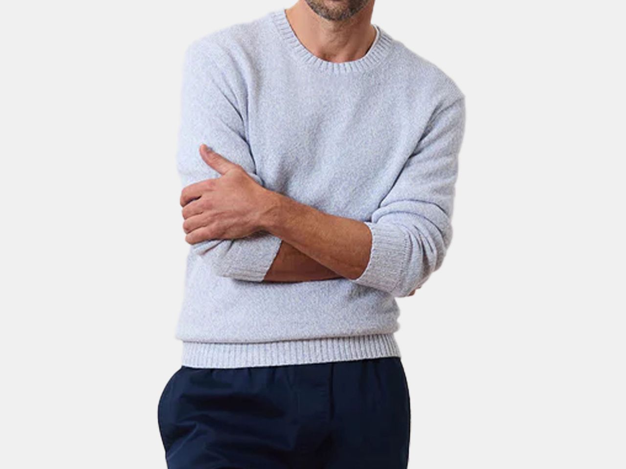 model in light blue sweater