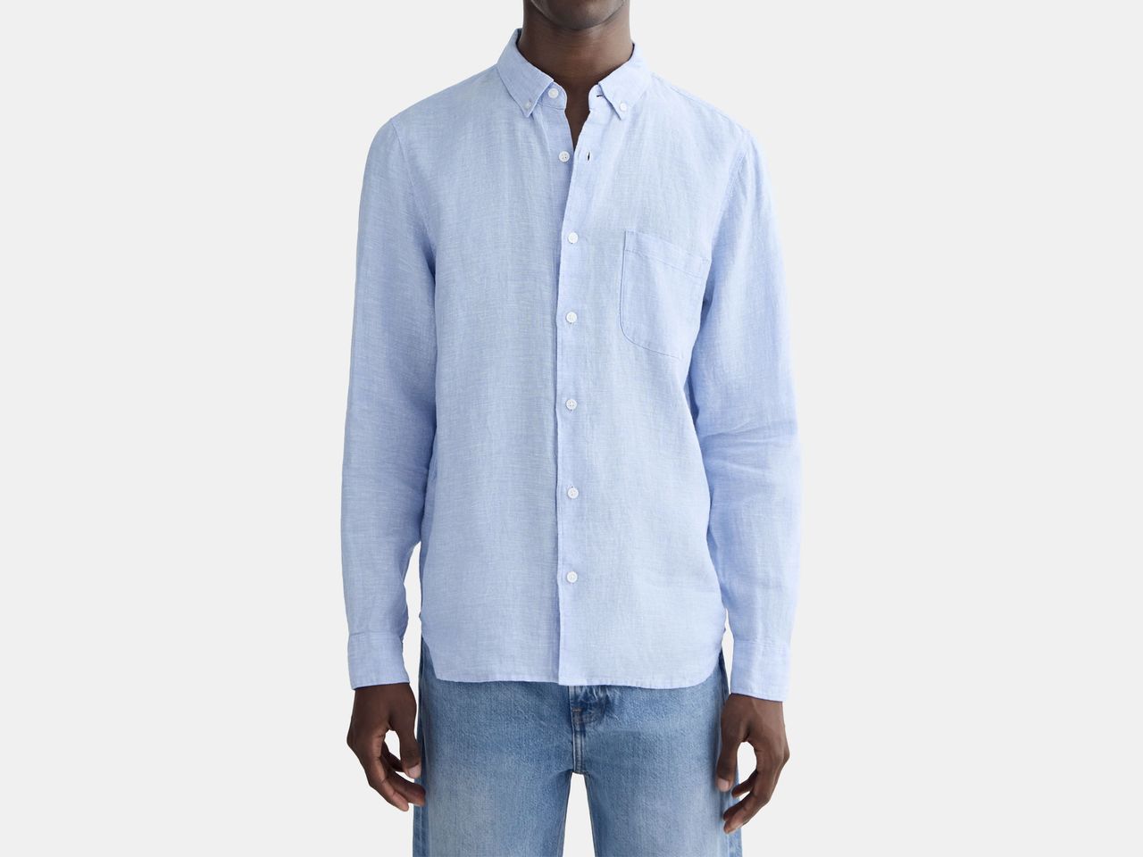 model in light blue shirt