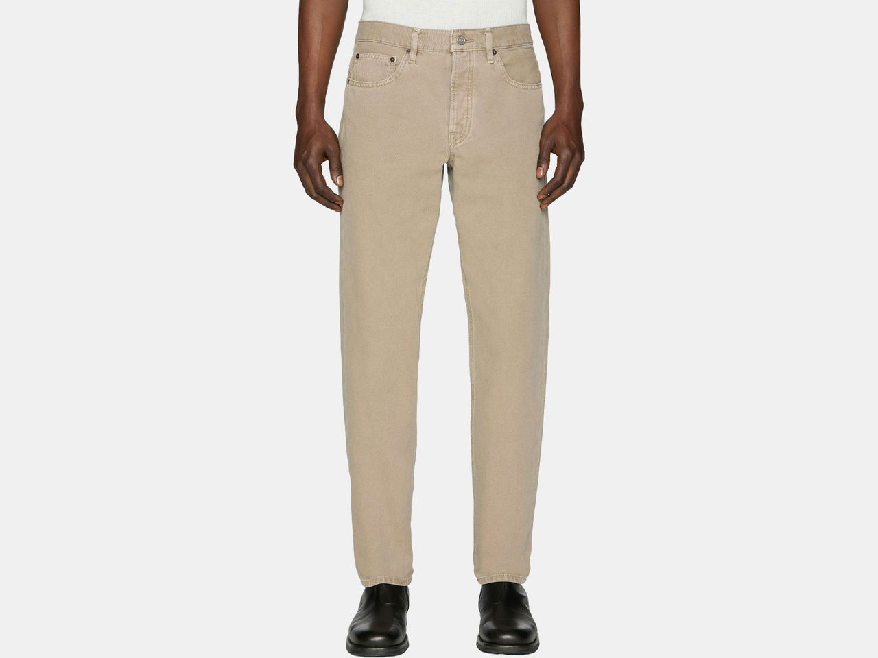 model in khaki colored jeans