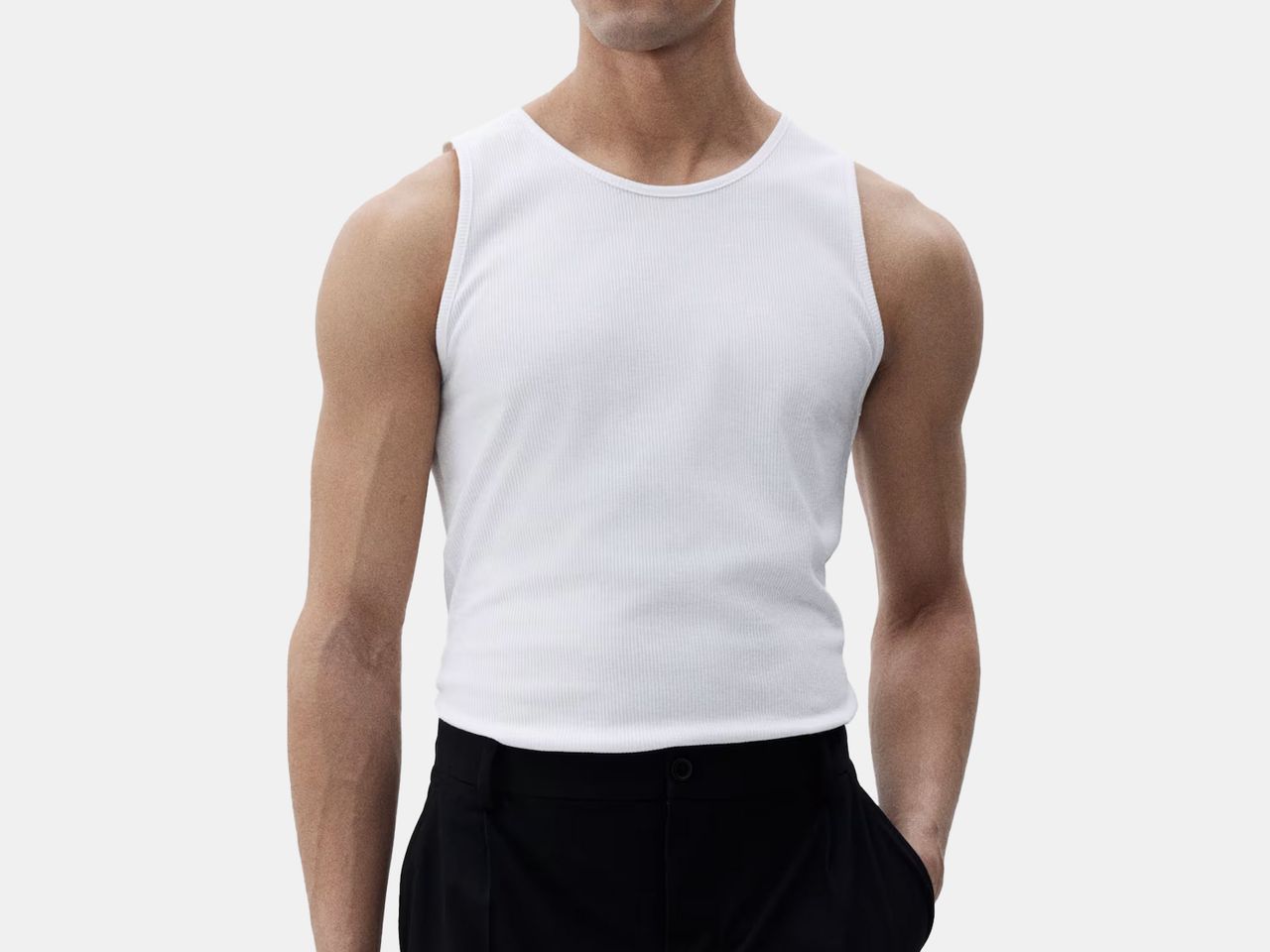 model in white tank top