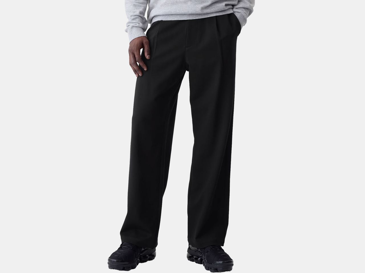model in black trousers