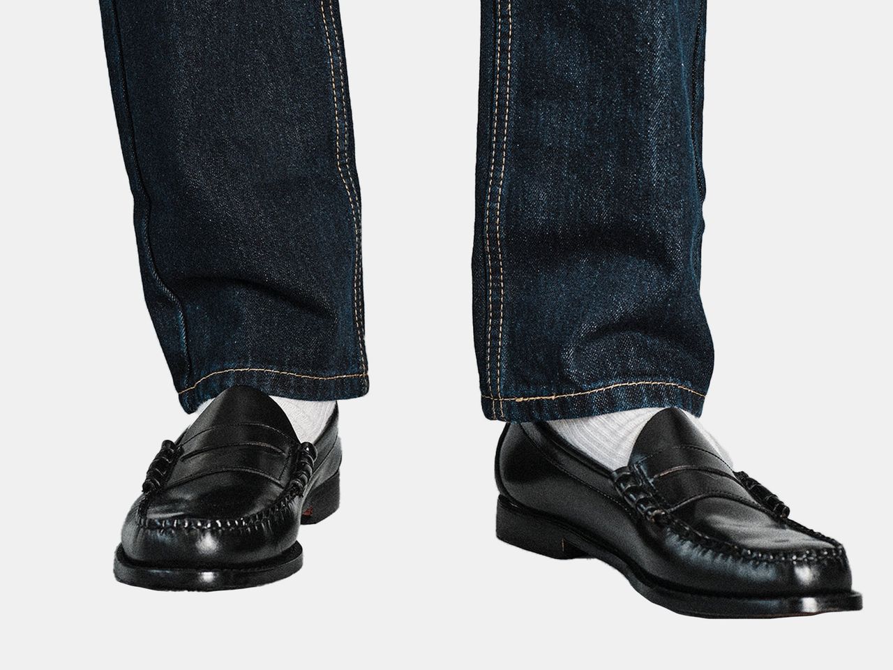 model wearing black loafers