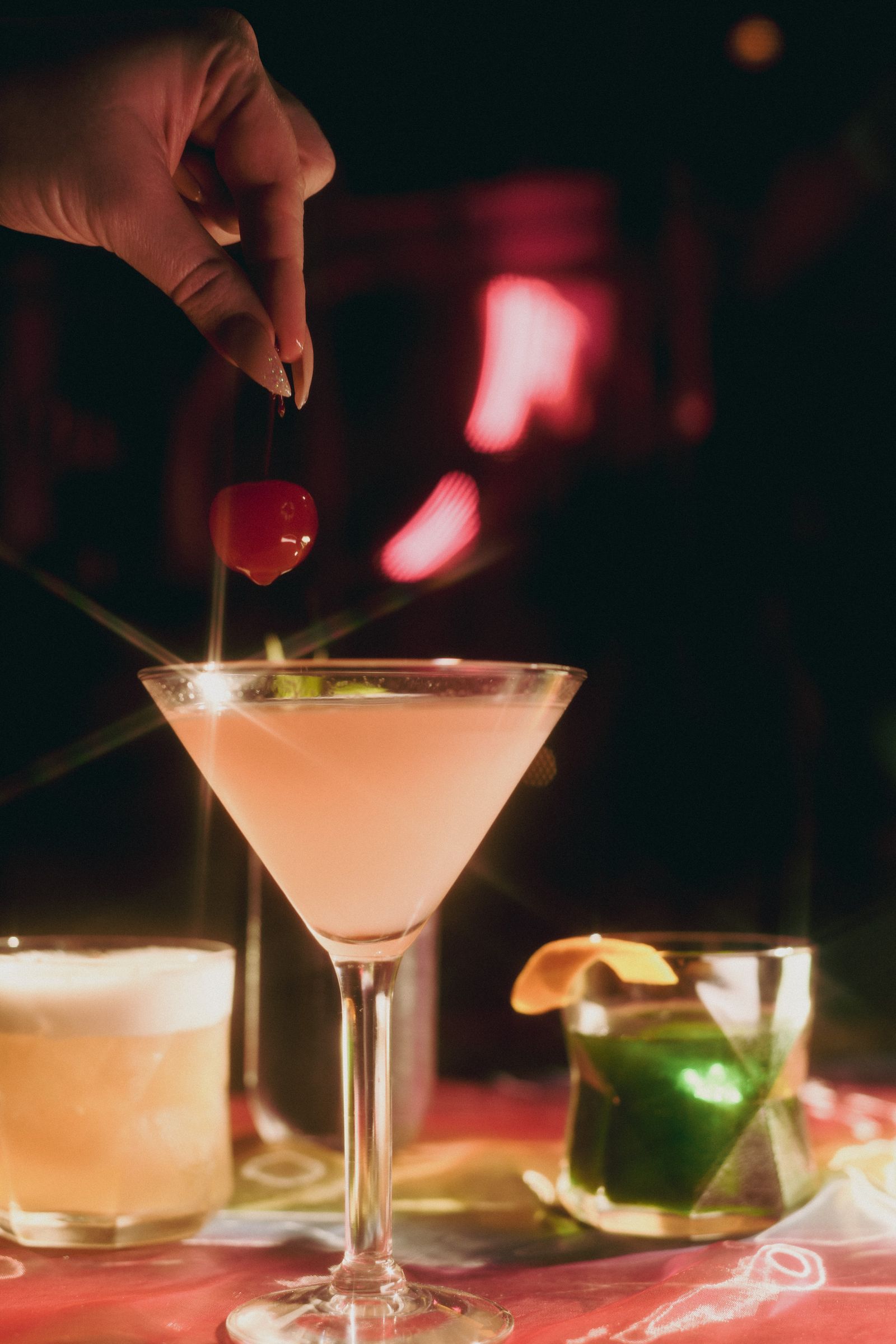 Image may contain Alcohol Beverage Cocktail Cup Baby and Person