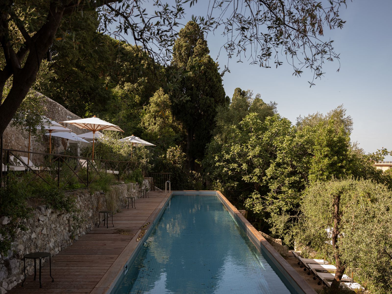 Image may contain Architecture Building Hotel Resort House Housing Villa Pool Water Swimming Pool and Outdoors