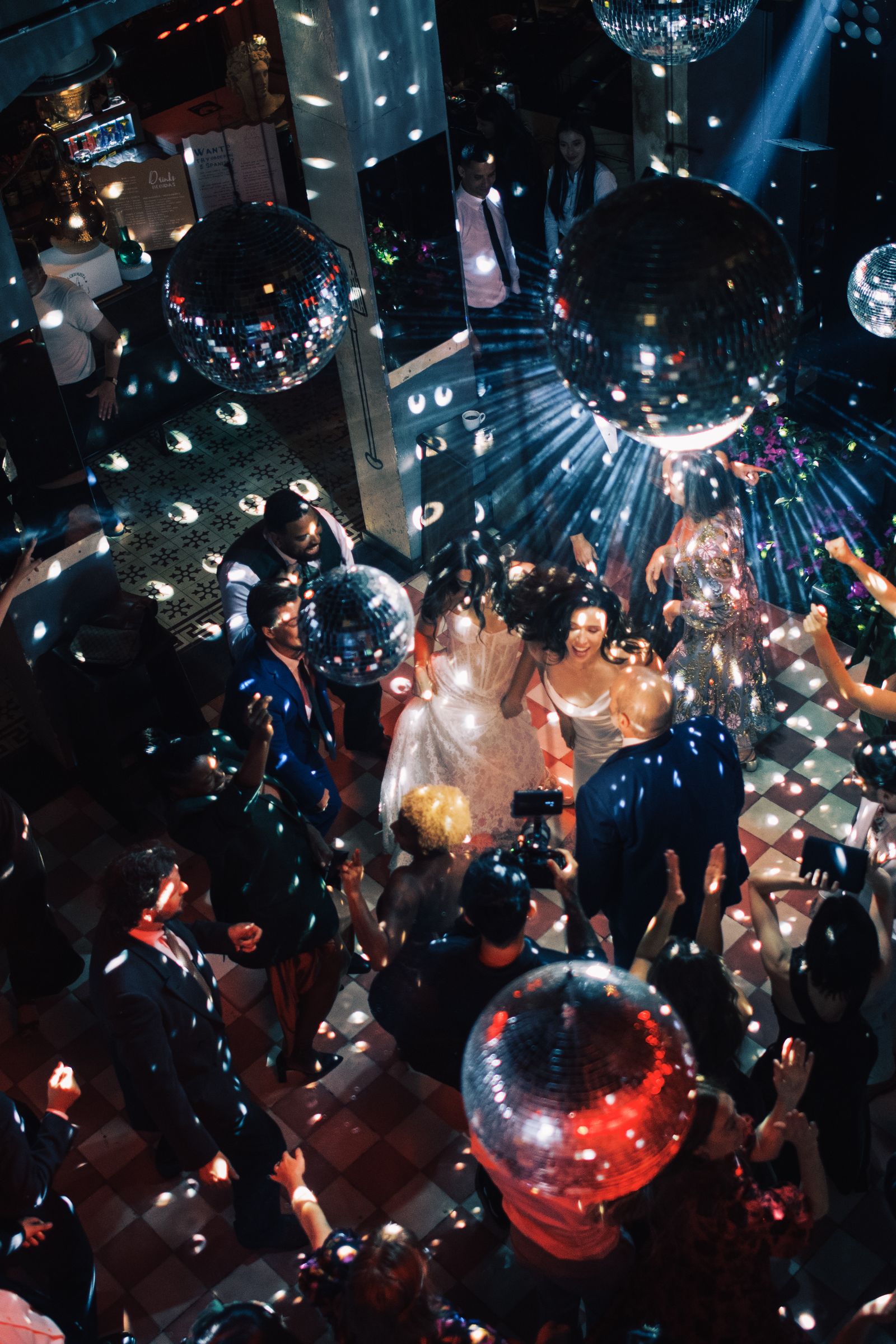 Image may contain Urban Club Night Club Person Disco Adult Helmet Camera Electronics Fun Party and Night Life