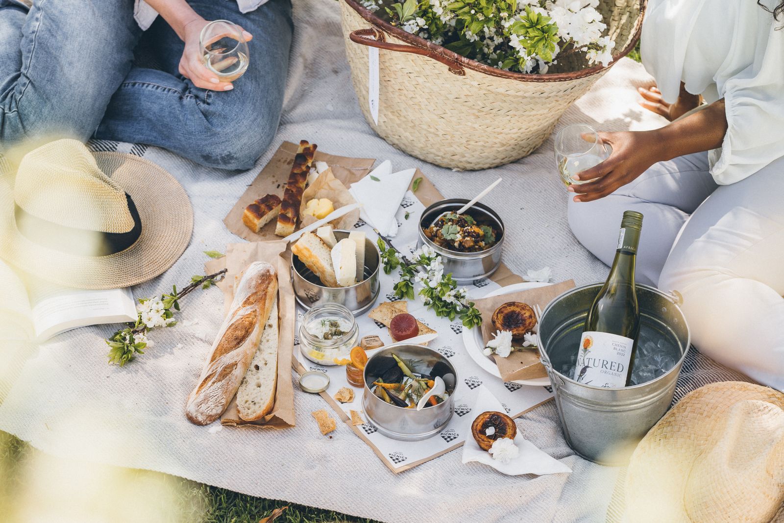 Image may contain Brunch Food Adult Person Bread Fun Clothing Hat Cup Plant and Plate