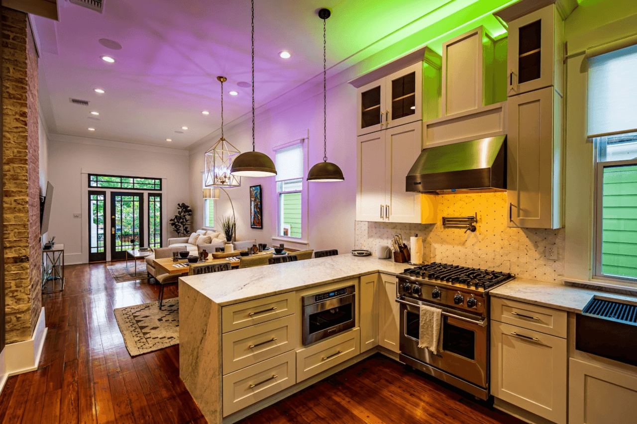 Image may contain: Indoors, Interior Design, Kitchen, Wood, Floor, Flooring, Hardwood, Home Decor, Appliance, and Device