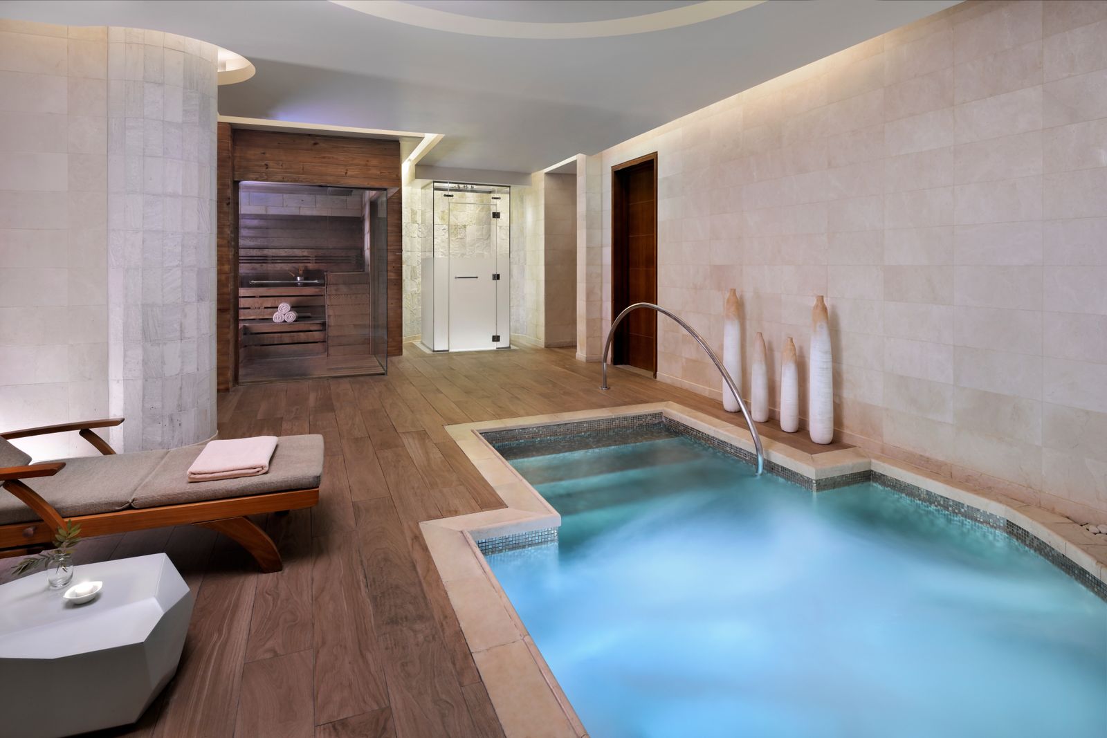 Image may contain Tub Indoors Interior Design Hot Tub Corner Bathing Bathtub and Person