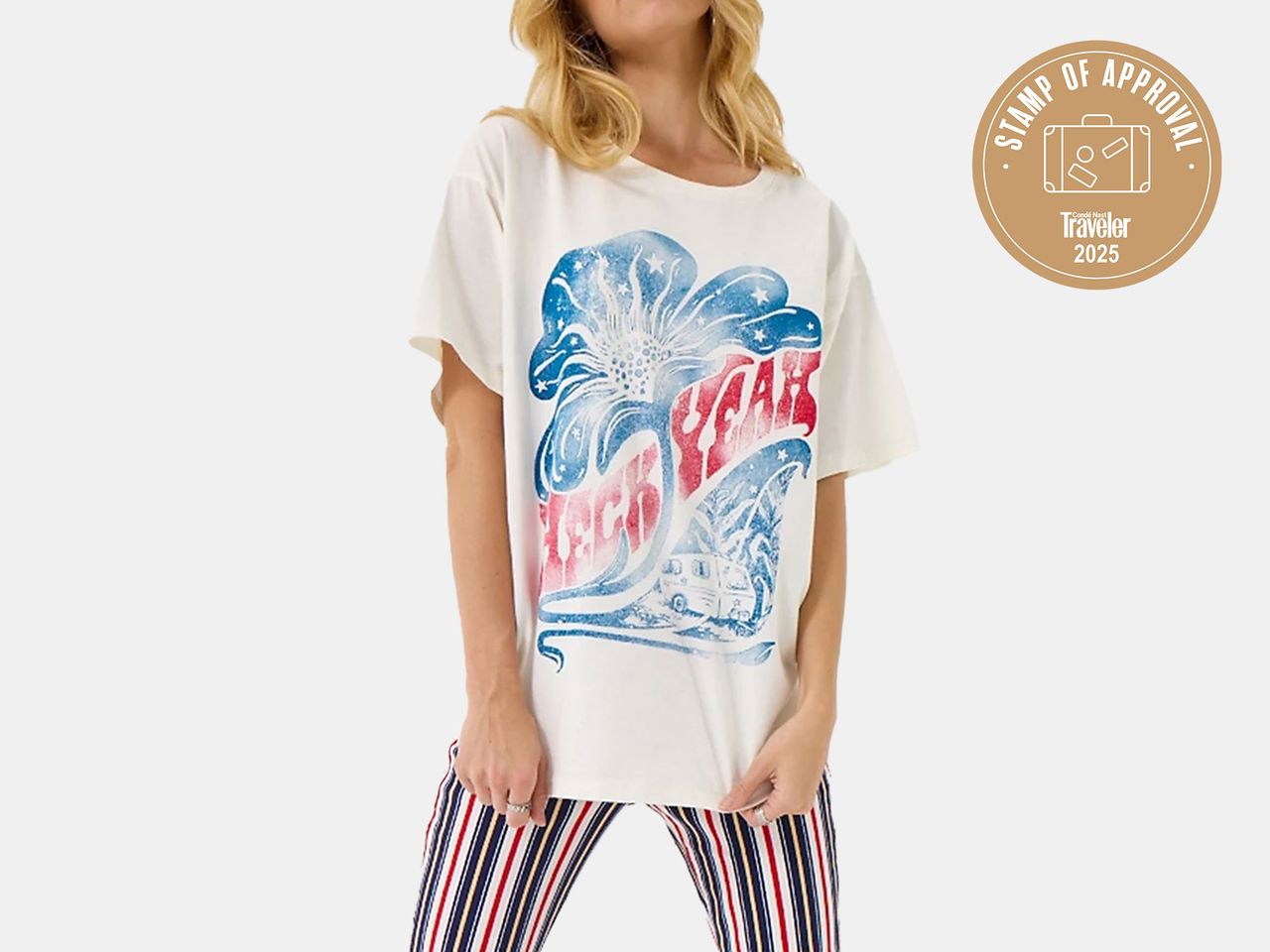 Model in white graphic t-shirt