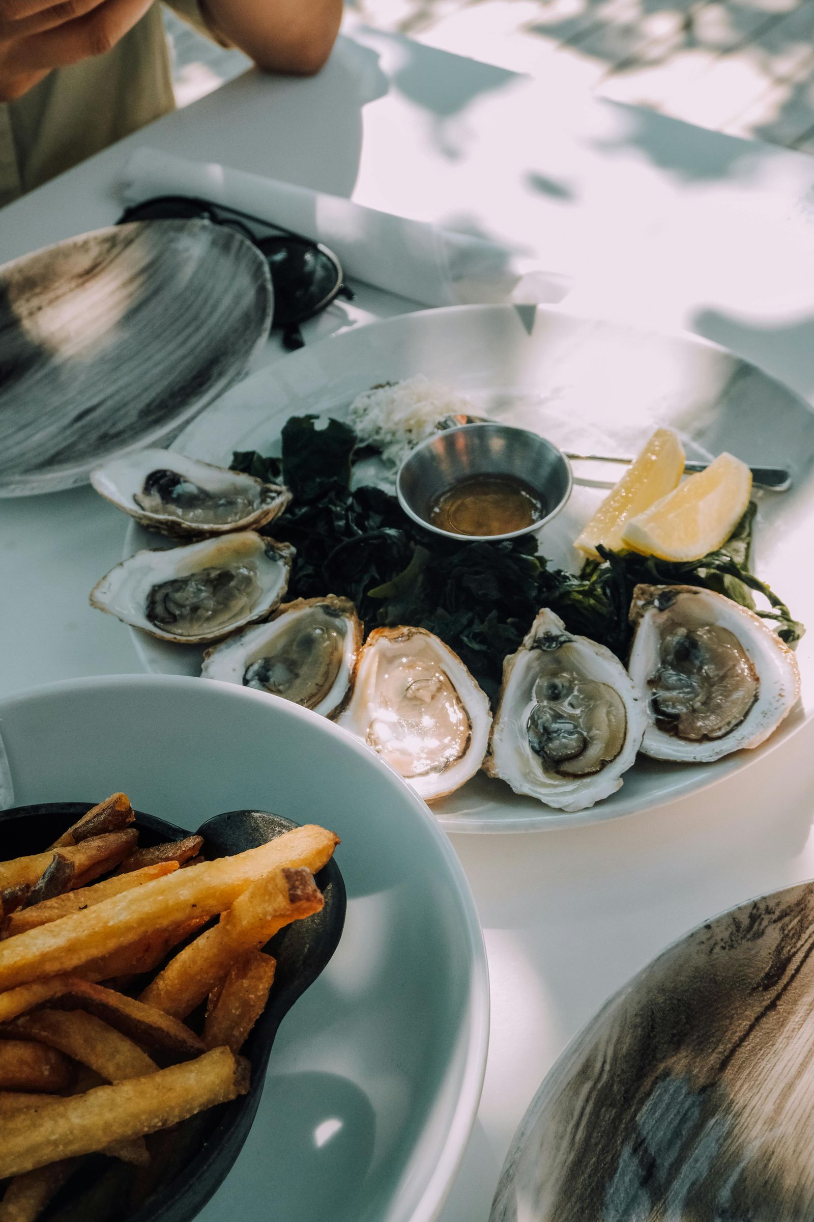 Image may contain Animal Clam Food Invertebrate Sea Life Seafood Seashell Food Presentation Baby Person and Brunch