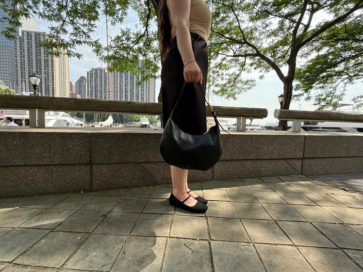 Image may contain: Adult, Person, Accessories, Bracelet, Jewelry, Bag, Handbag, Clothing, Footwear, Shoe, and Pedestrian