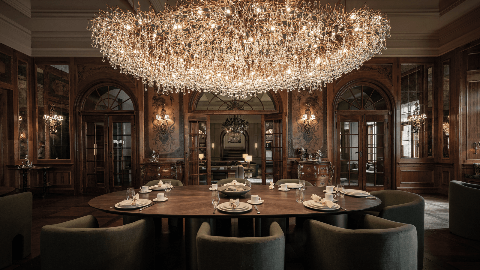 Image may contain Architecture Building Dining Room Dining Table Furniture Indoors Room Table Chandelier and Lamp