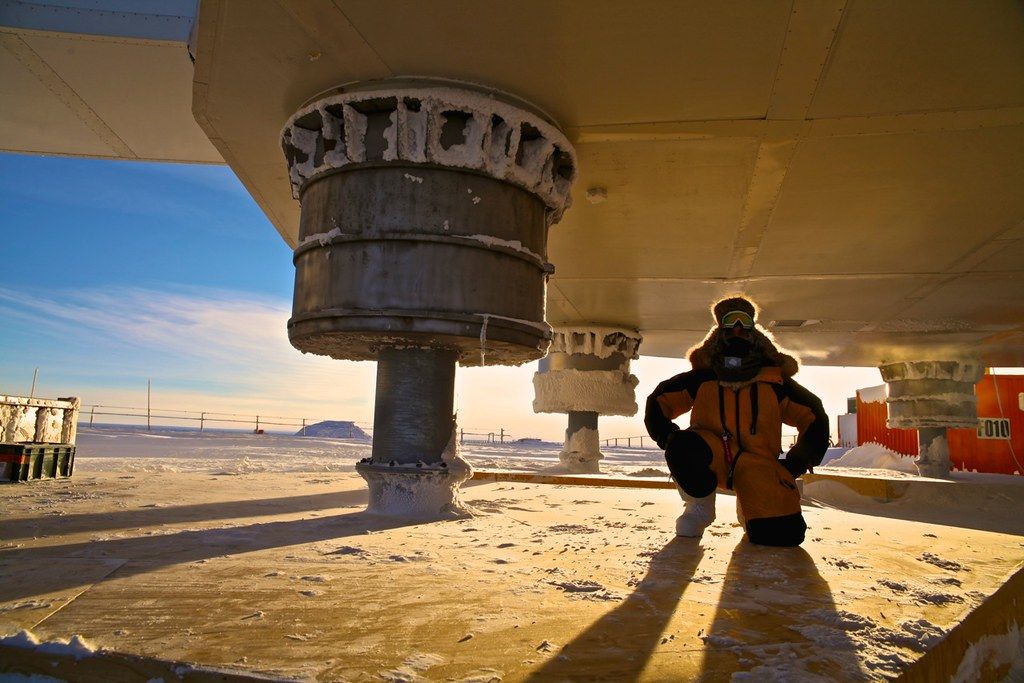 Image may contain Person Worker Architecture Building Outdoors Shelter Clothing and Hat