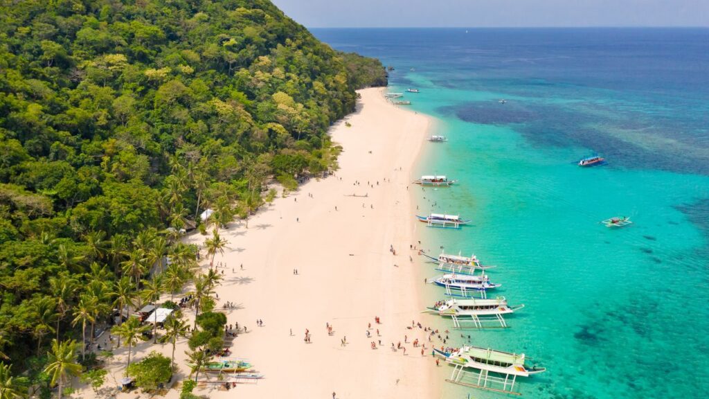 The Best Beaches in the Philippines for Surfing, Seclusion, and Powder-Soft Sands