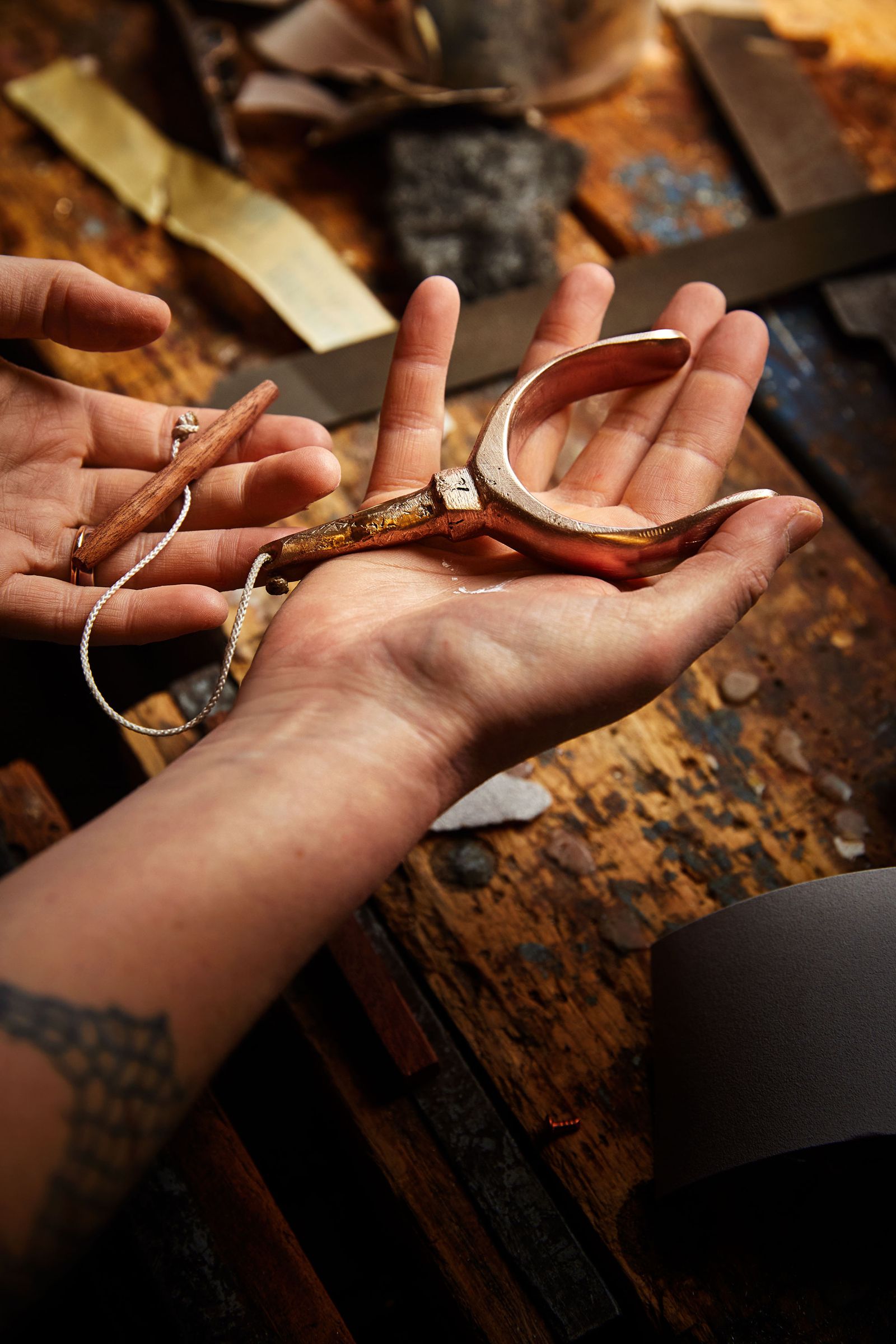 Image may contain Body Part Finger Hand Person Skin Accessories Tattoo Jewelry Ring Blade Knife and Weapon