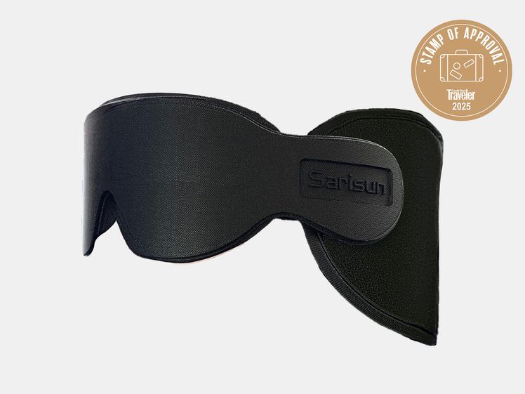 black neck pillow and eye mask