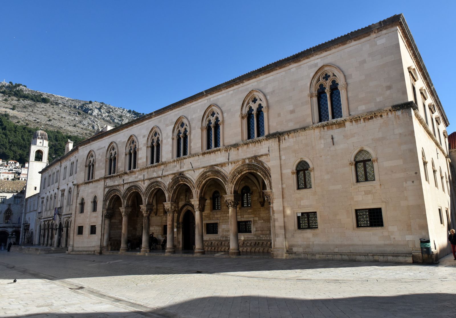 Image may contain Arch Architecture Building Monastery Gothic Arch Person House Housing and Villa