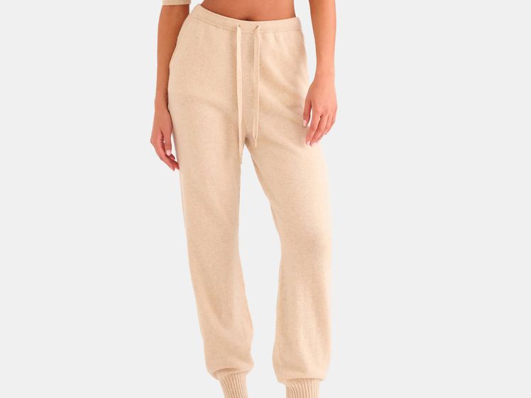model wearing beige jogger pants