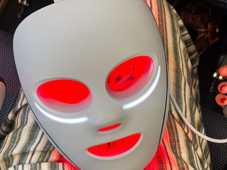 Image may contain: Cup, Person, and Mask