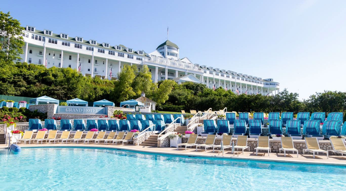 Image may contain Architecture Building Hotel Resort Pool Water Swimming Pool Chair Furniture and Waterfront