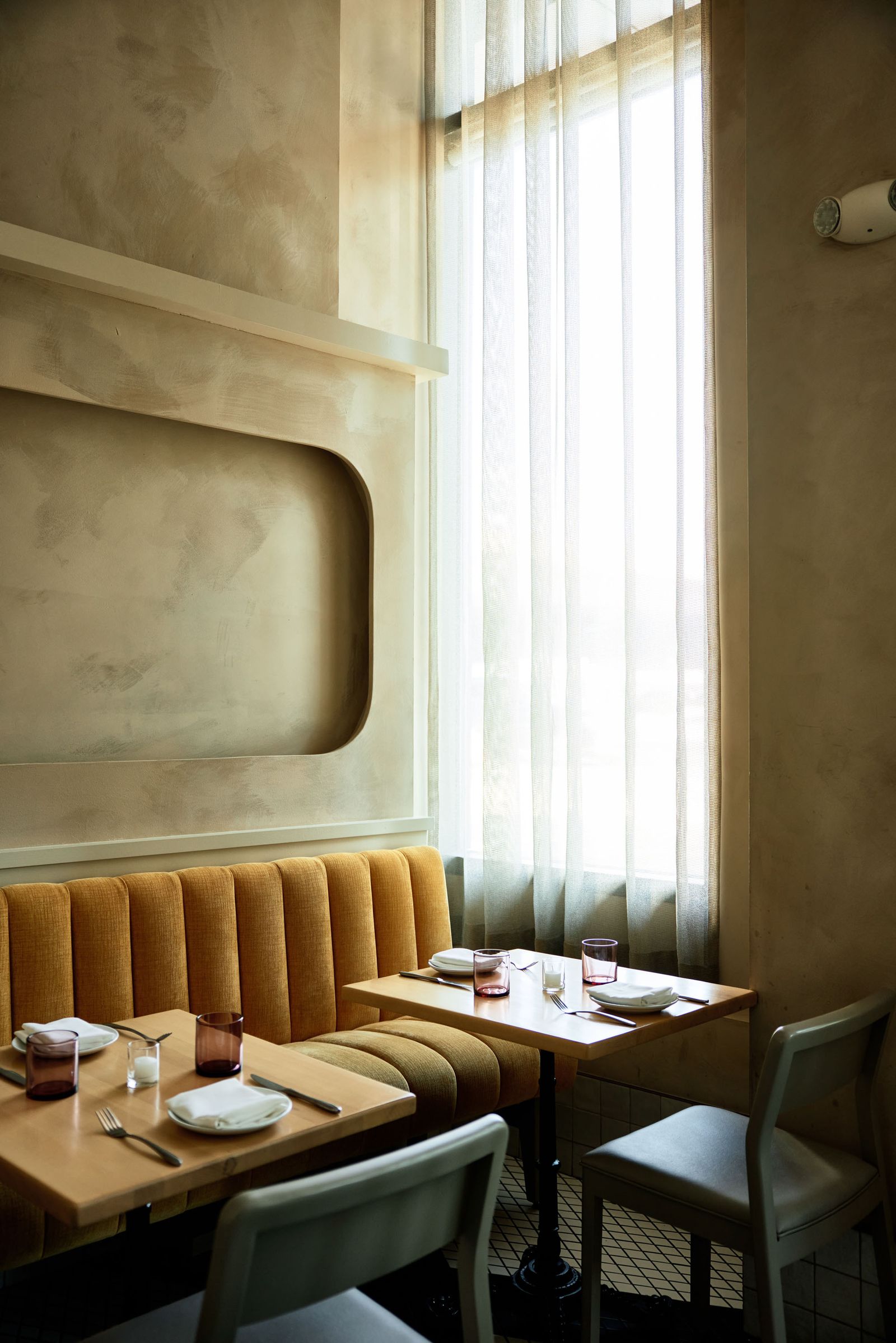 Seating and tables inside of Baleia restaurant