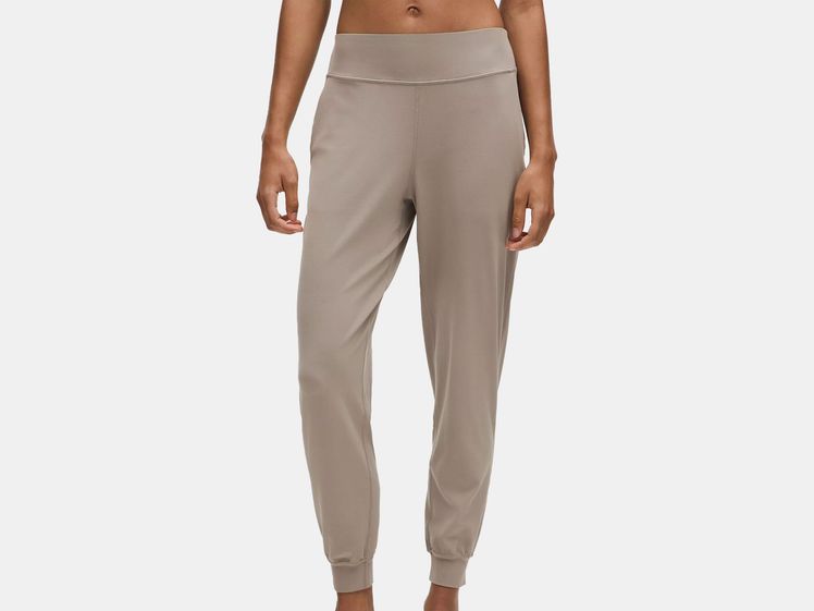 model wearing beige jogger pants