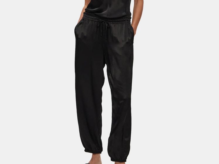 model wearing black jogger pants