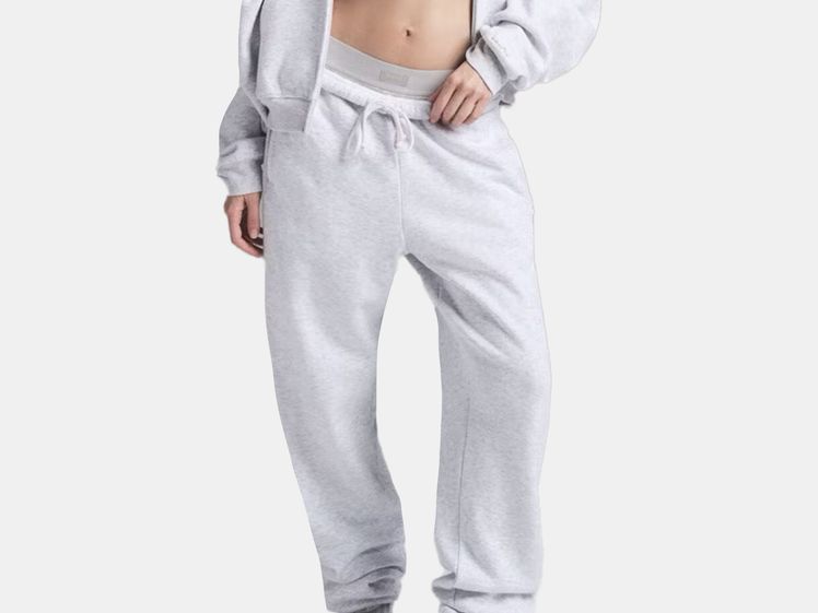 model wearing grey jogger pants