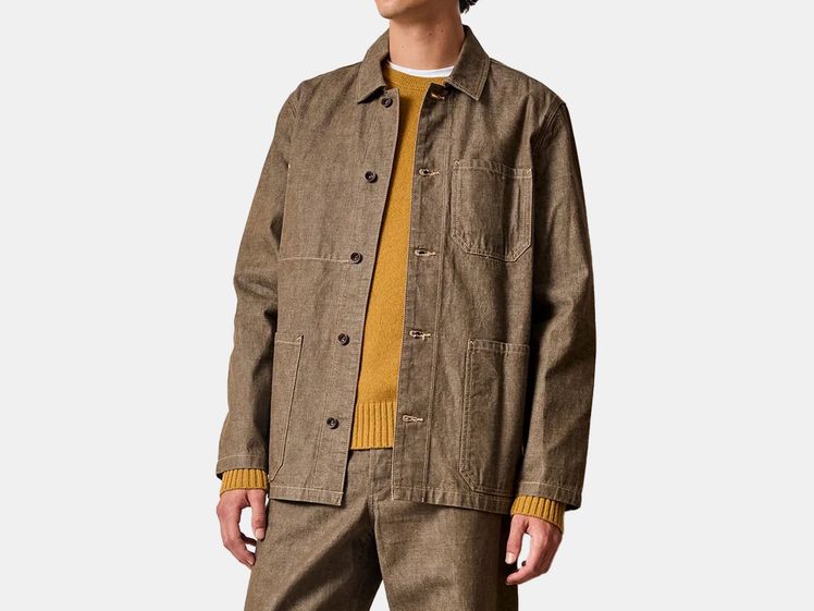 model in whiskey colored coat