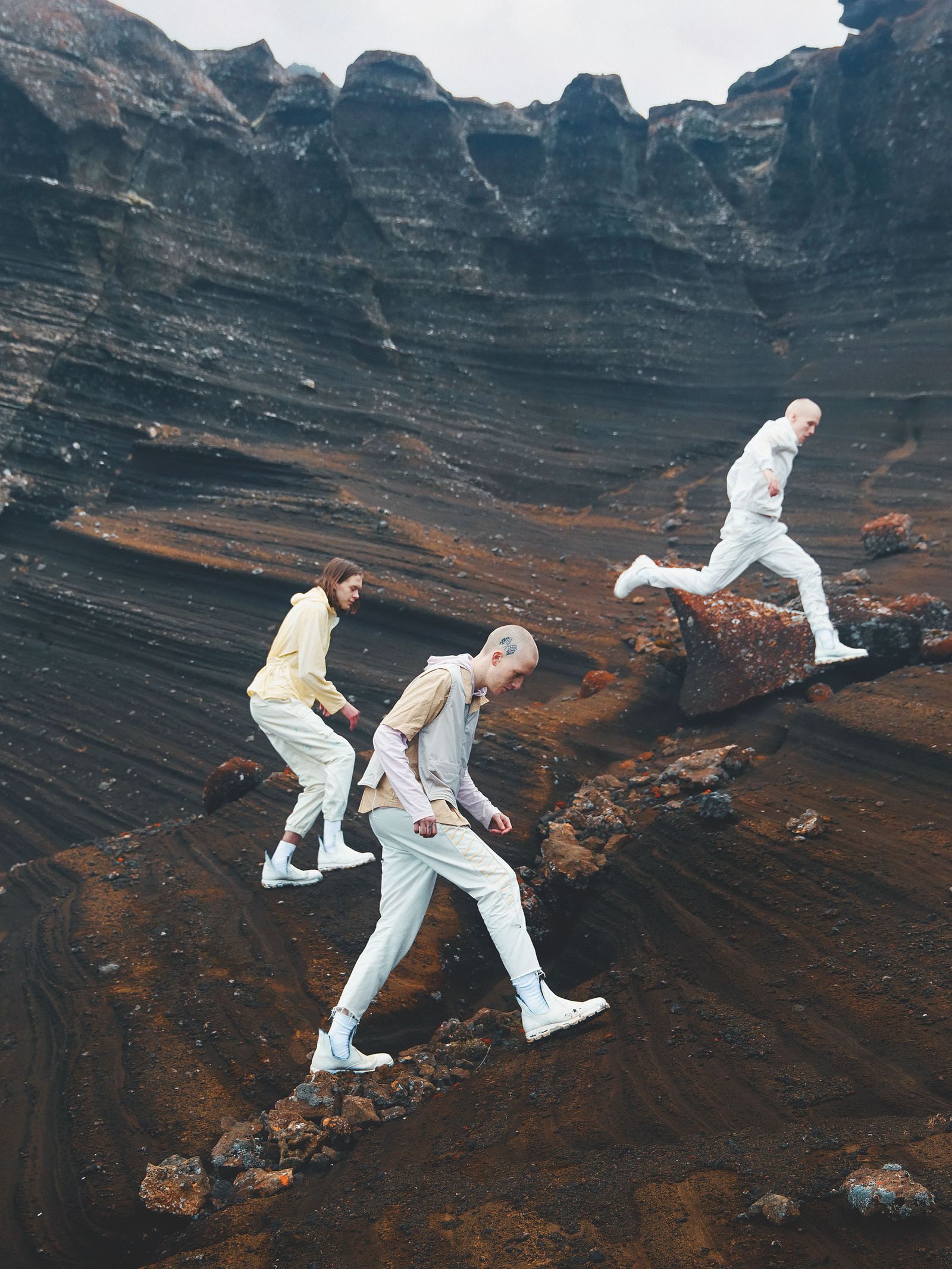 Image may contain Danny Byrd Photography Clothing Pants Adult Person Footwear Shoe Rock Face Head and Portrait