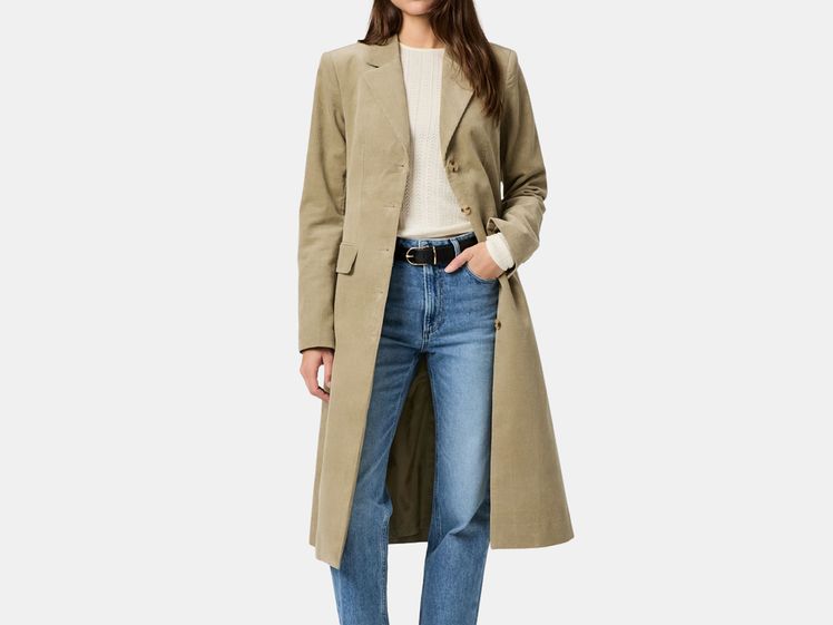model wearing long trench coat
